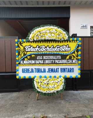 Papan Bunga Duka di Indra Jaya